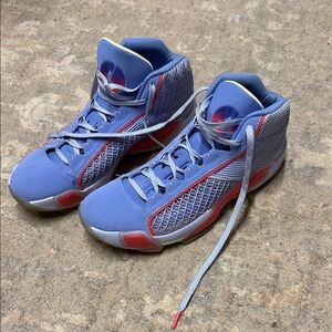 Jordan 38 Fadeaway Blue and Red High-Top Sneakers